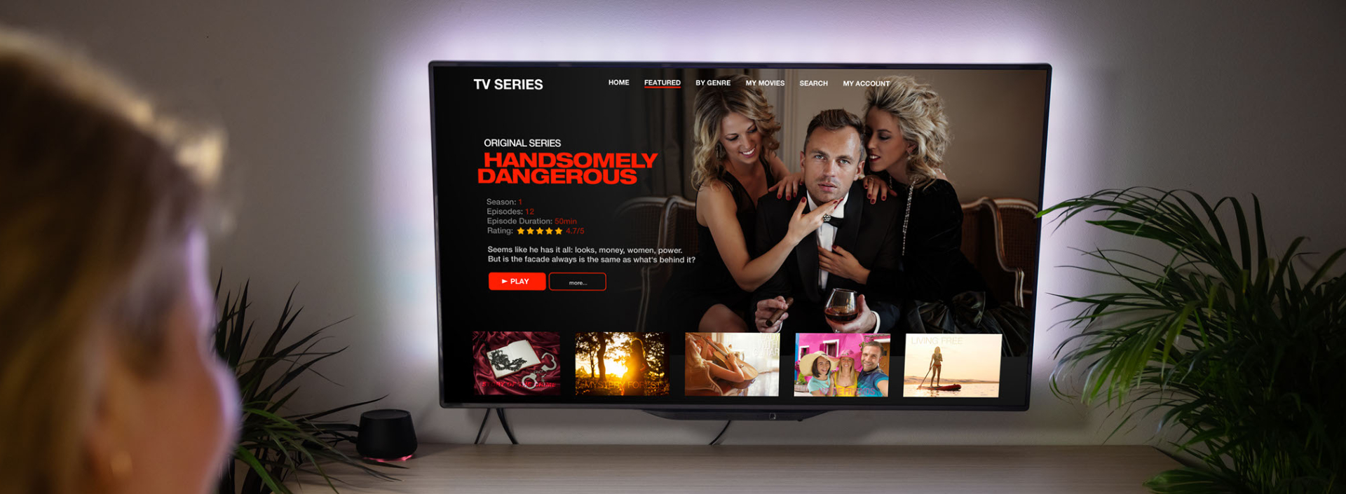A woman watching a tv show via a streaming service.